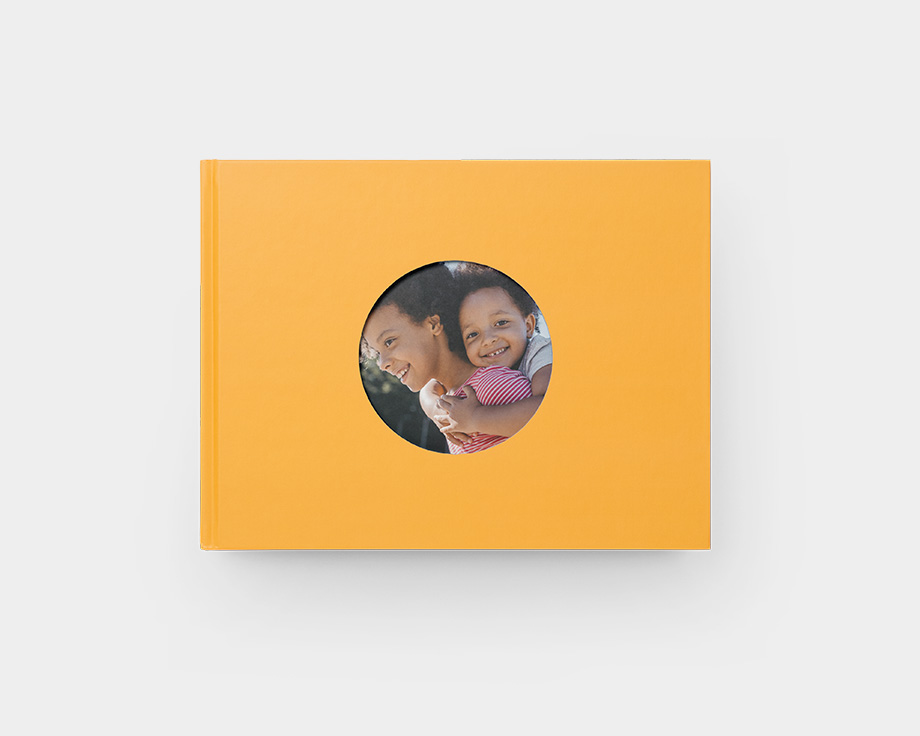 Fotobok med runt fönsteromslag