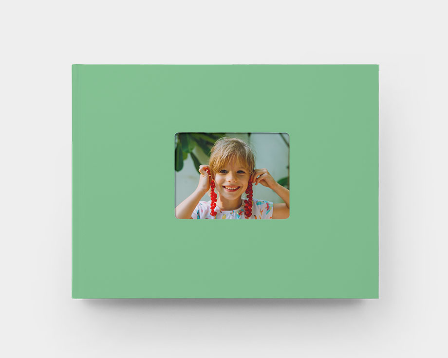 fotoboken med fönsteromslag